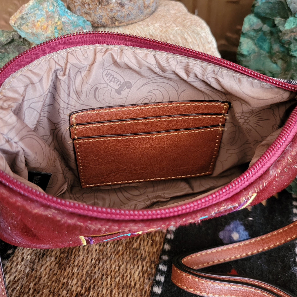 The inside of the wallet is lined and has multi-card slots.