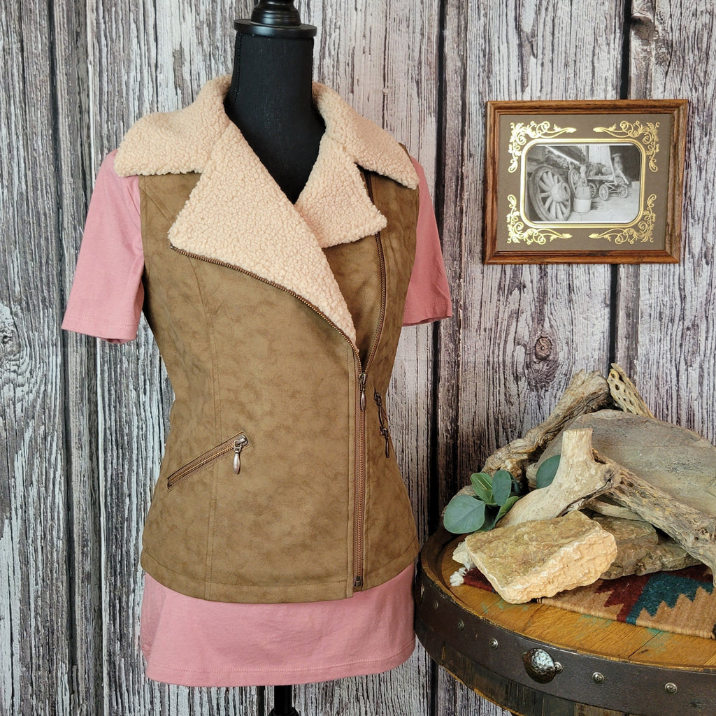 Brown vest with beige fleece interior and collar, featuring multiple front pockets.