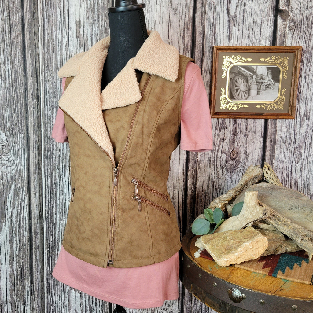 Brown vest with beige fleece interior and collar, featuring multiple front pockets.