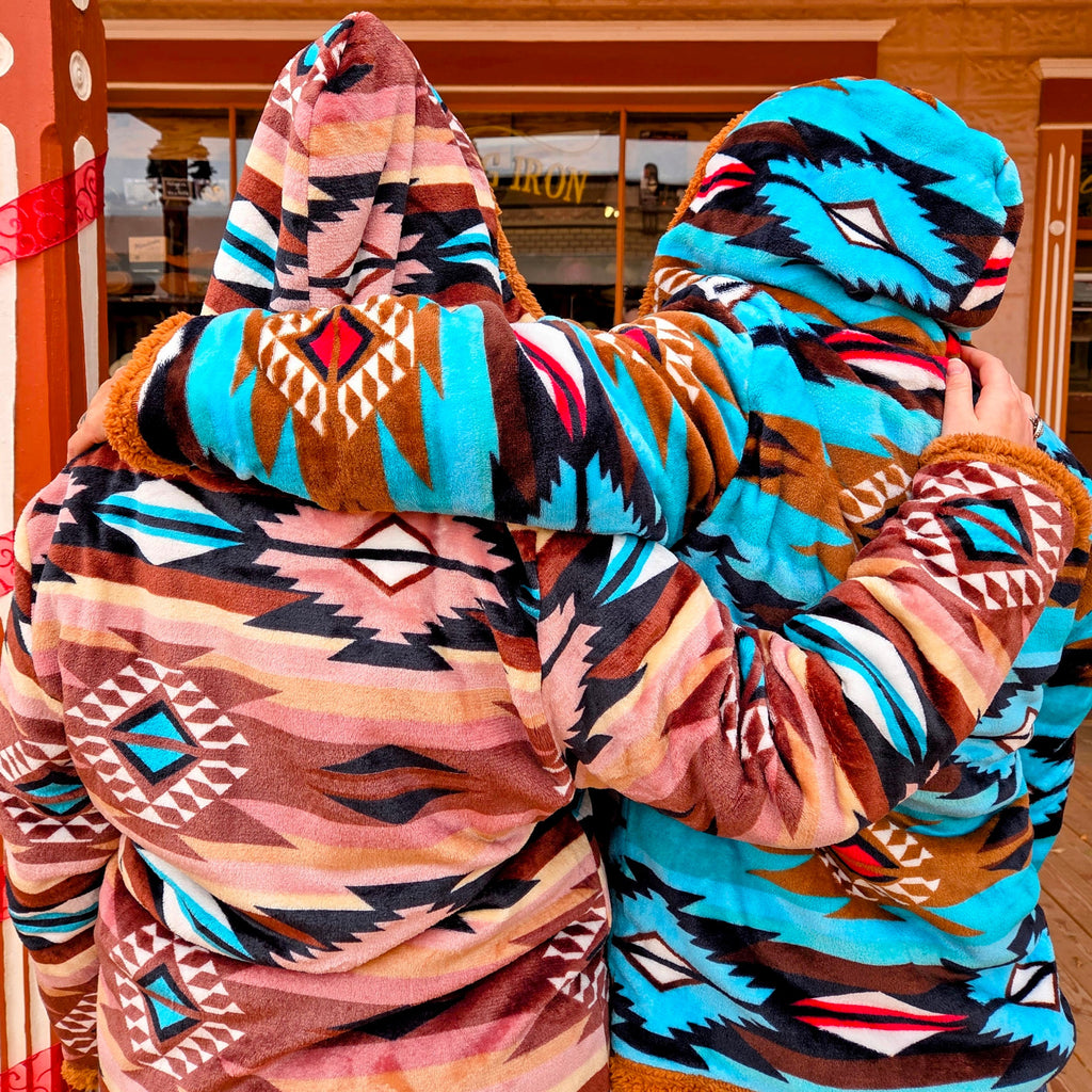 Women's Fleece Jacket by All Weather Outwear pink and turquise aztec design on models