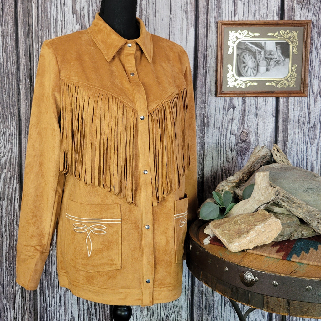 Tan jacket with front to back fringe, button-up design, and front pockets.