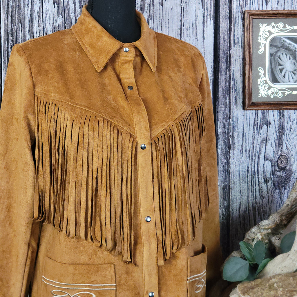 Tan jacket with front to back fringe, button-up design, and front pockets.
