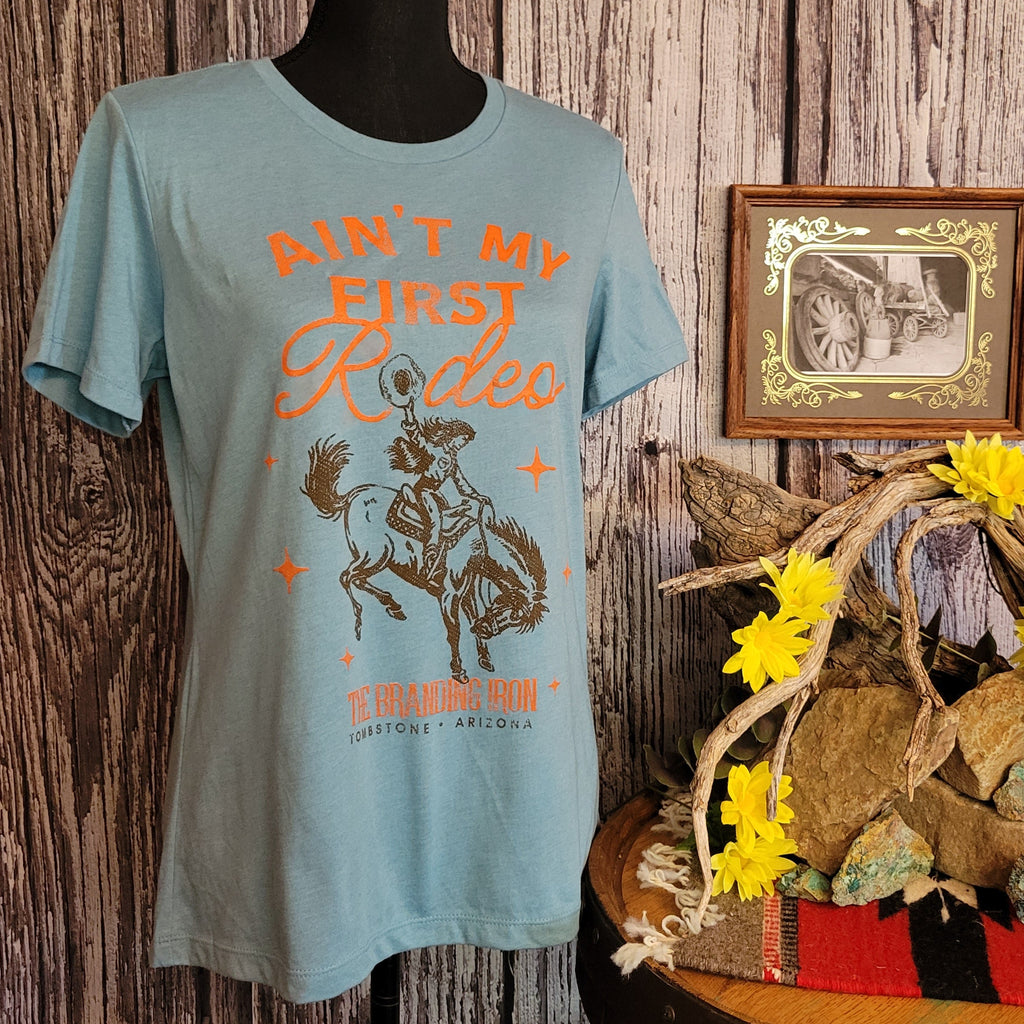 Light blue t-shirt with graphic design.