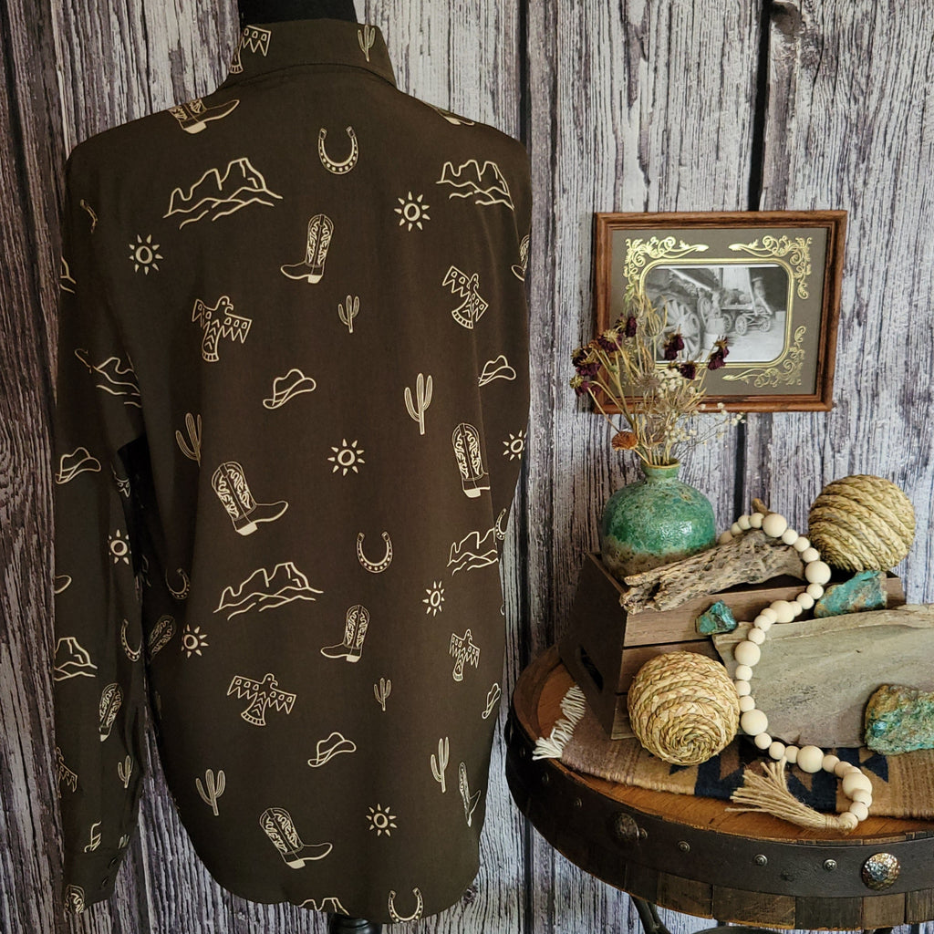 Brown button down long sleeved shirt with western print.