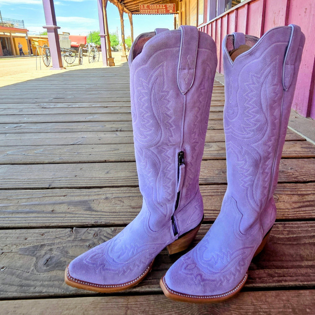 Lavender suede Cassandra boots by Ariat, showcasing intricate stitching.