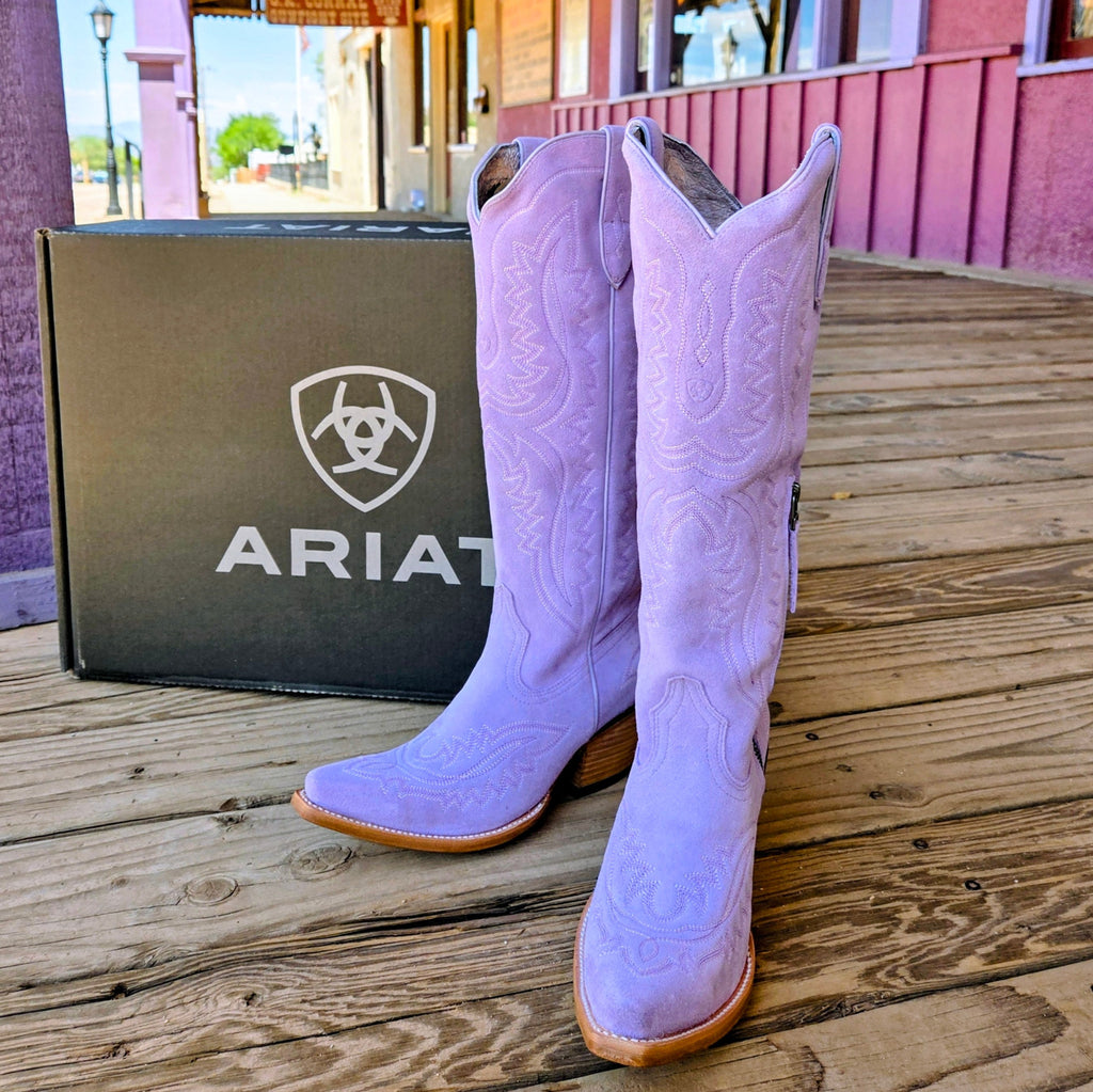 Lavender suede Cassandra boots by Ariat, showcasing intricate stitching. With Ariat box.