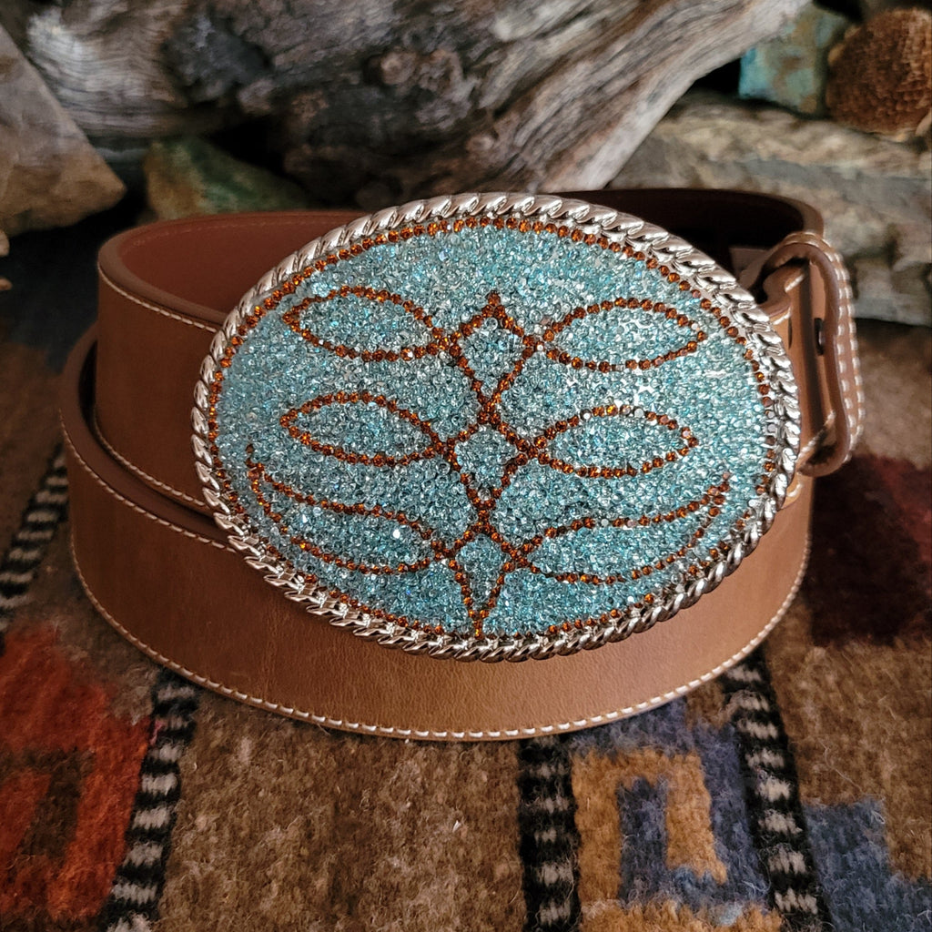Smooth, brown leather belt with rhinestone buckle.