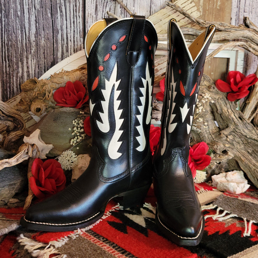 Black leather boot with snip toe and decorative white and red cut-out details on the shaft.