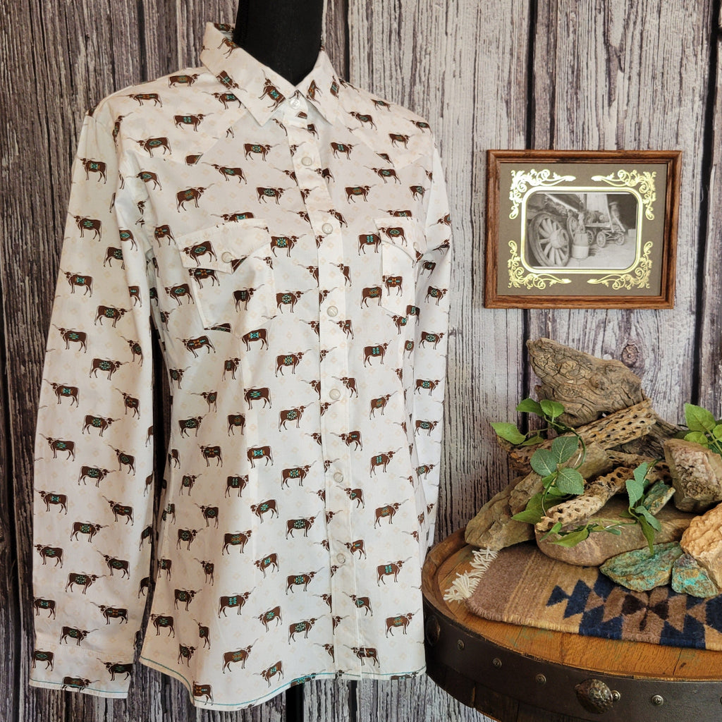 Women's long sleeve snap button down in white with bull pattern.