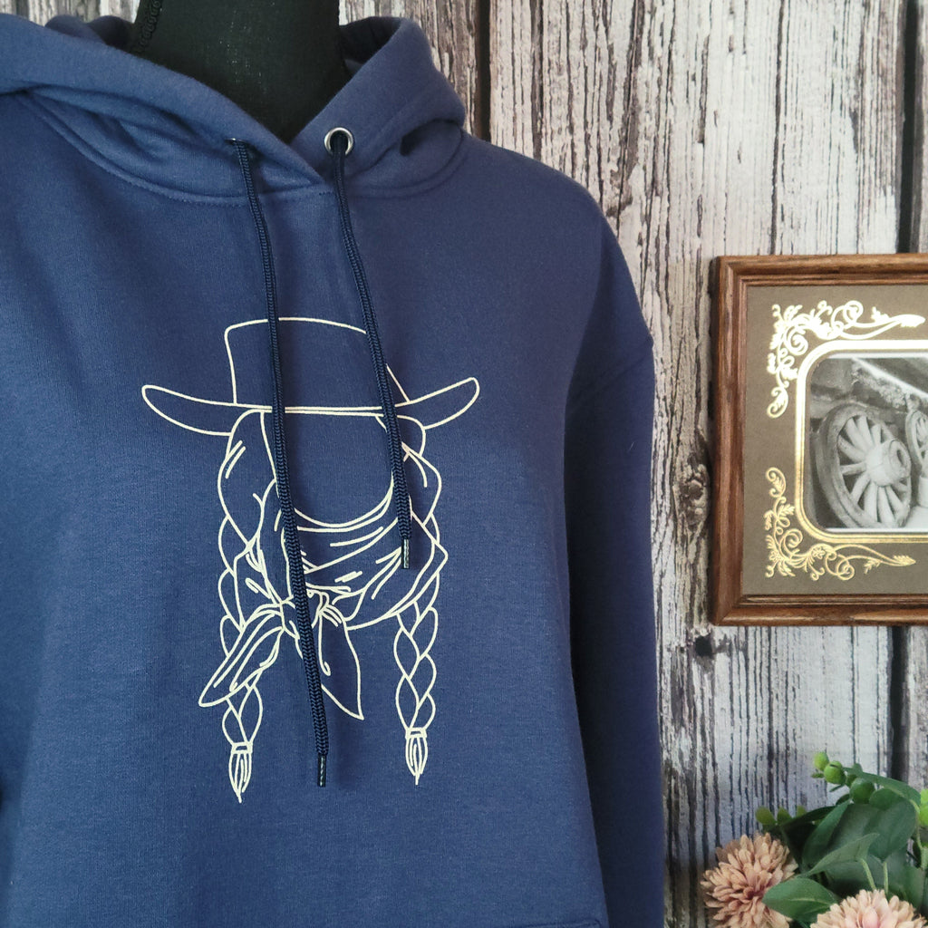 Close-up of the cowgirl outline on the front.