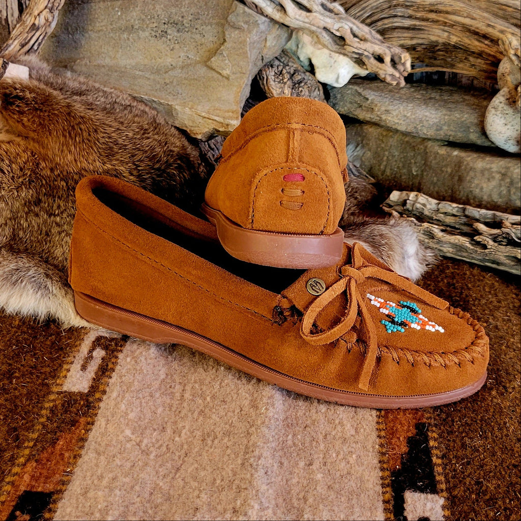 Pair of brown moccasins with decorative beading and lace.