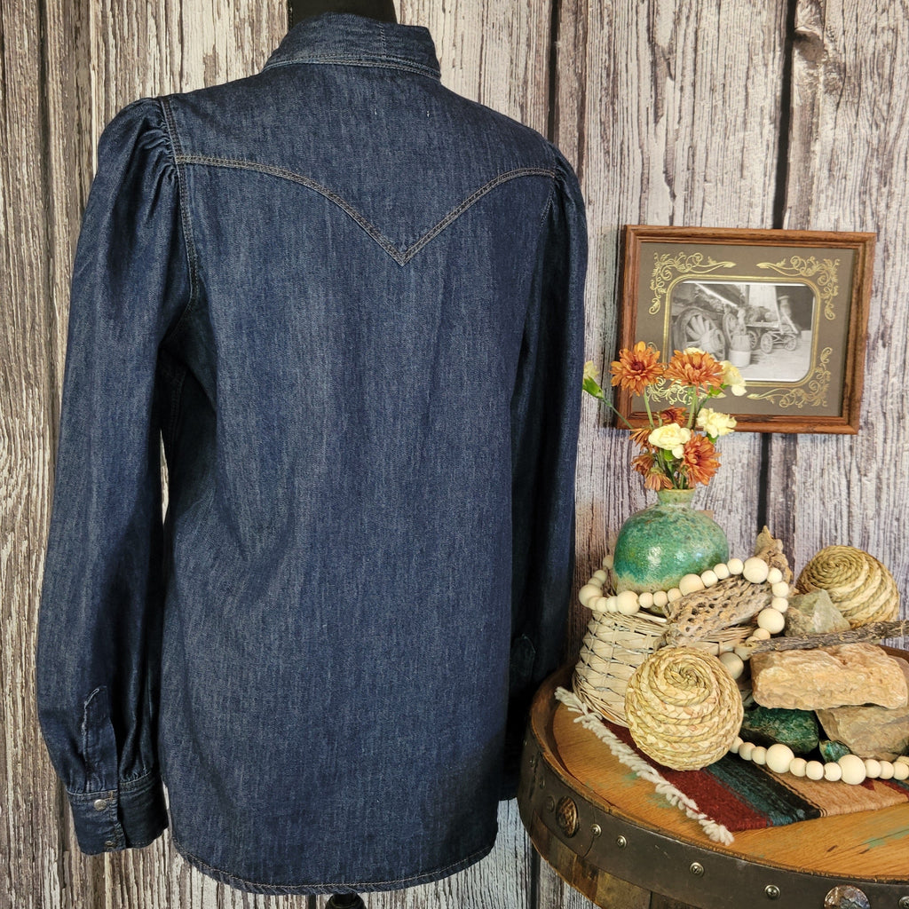 The back features the denim color and stitching.
