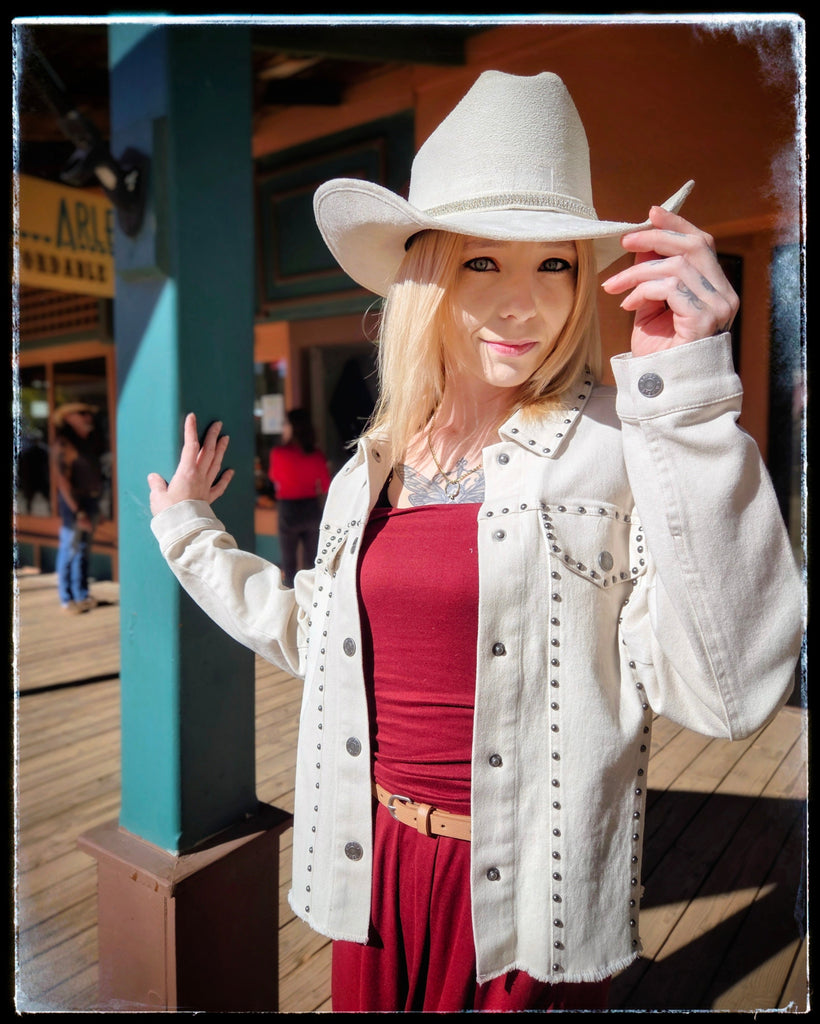 Model in White western style  jacket w/metal rivets by Cripple Creek Ranchwear
