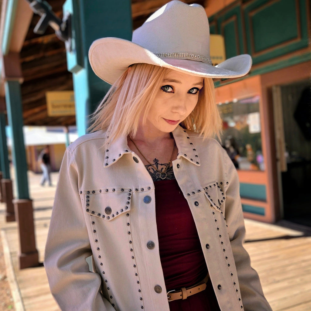 Model in White western style  jacket w/metal rivets by Cripple Creek Ranchwear