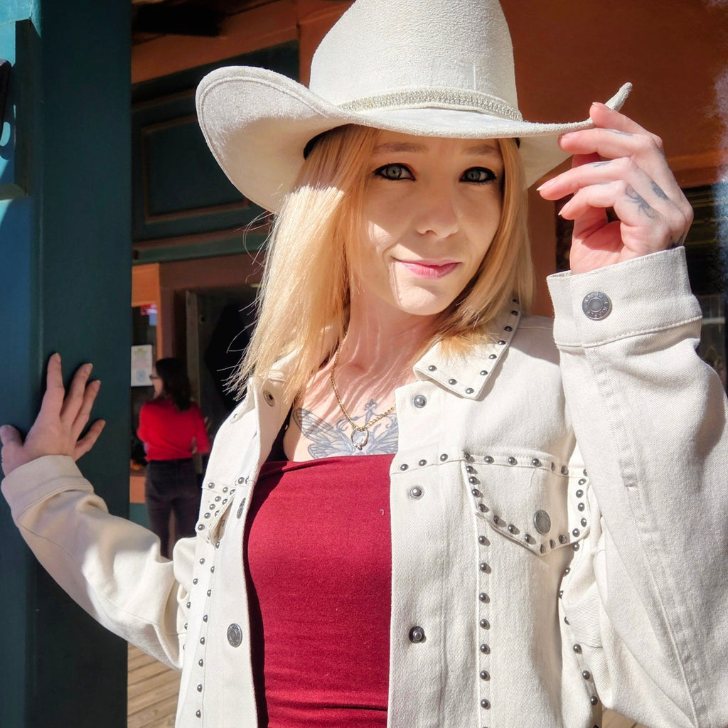 Model in White western style  jacket w/metal rivets by Cripple Creek Ranchwear