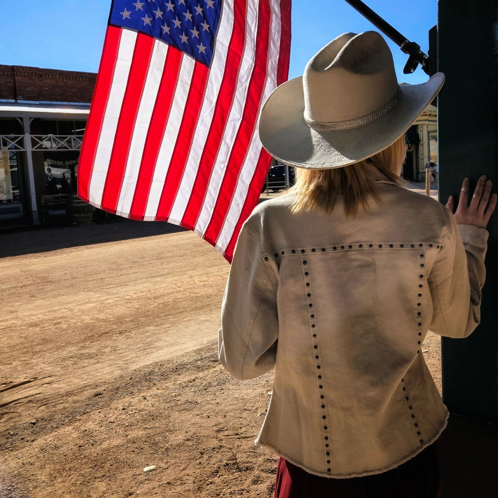 Model in White western style  jacket w/metal rivets by Cripple Creek Ranchwear