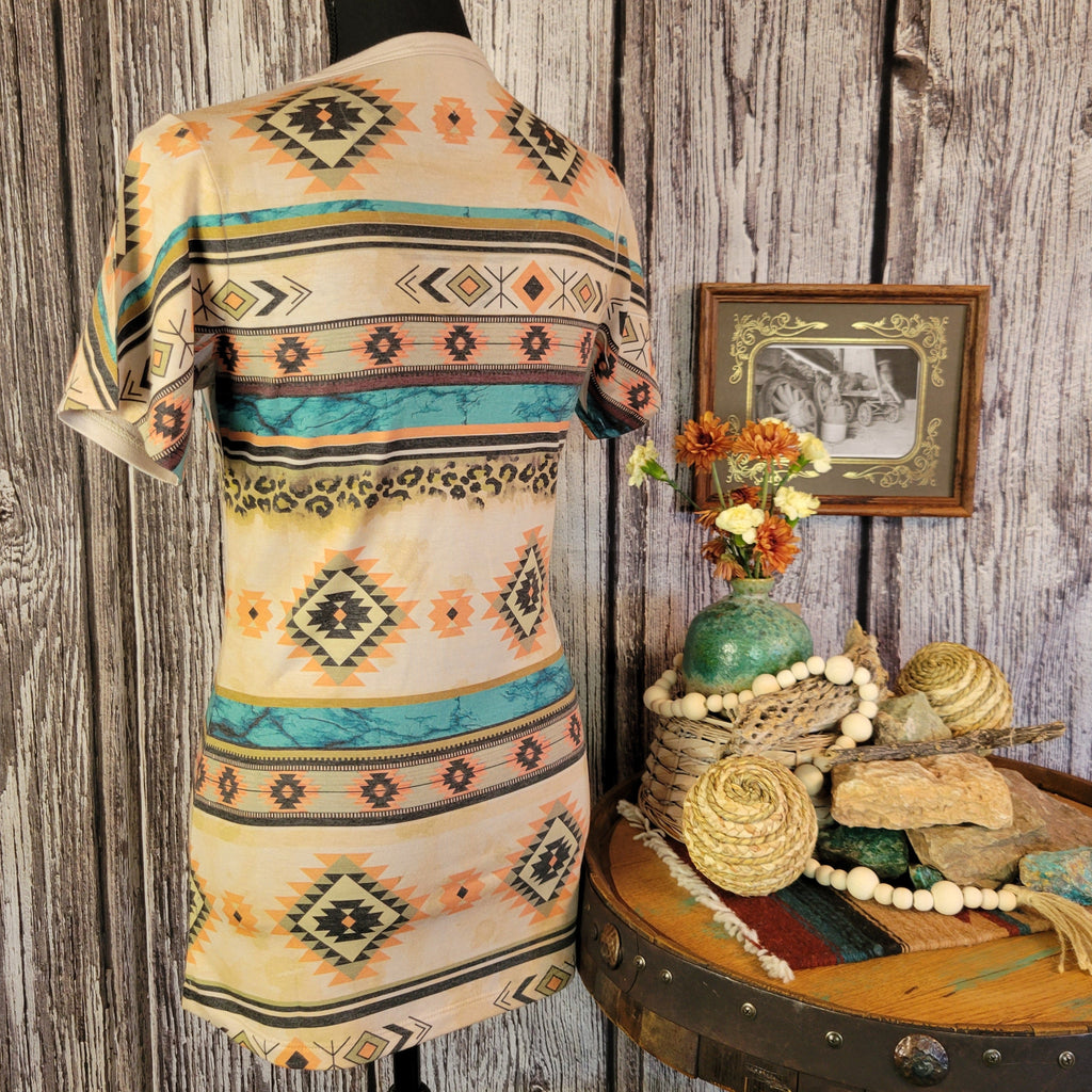 The back of the tee showcases its' southwestern designs in vibrant colors.