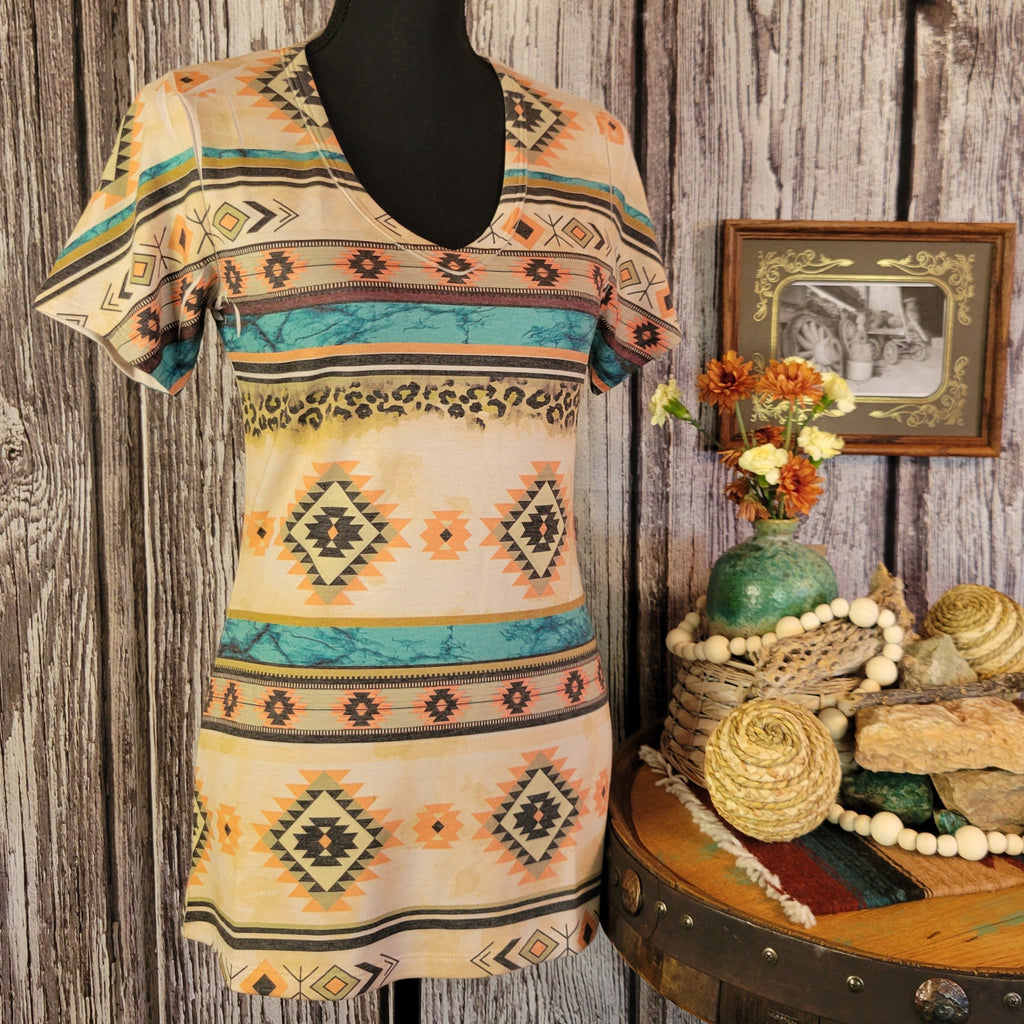 V-neck tee with southwestern designs in vibrant colors.