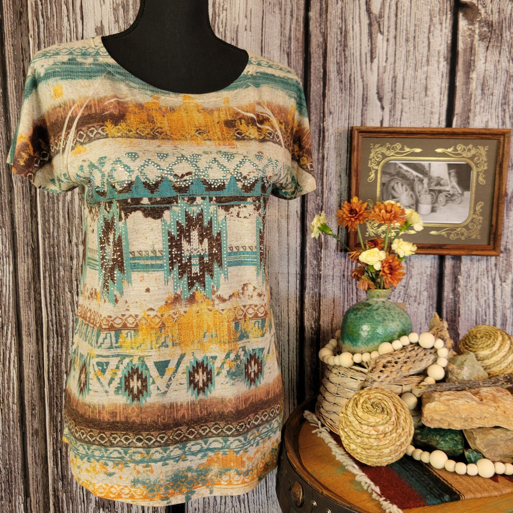 Tee with southwestern patterns and vibrant colors.