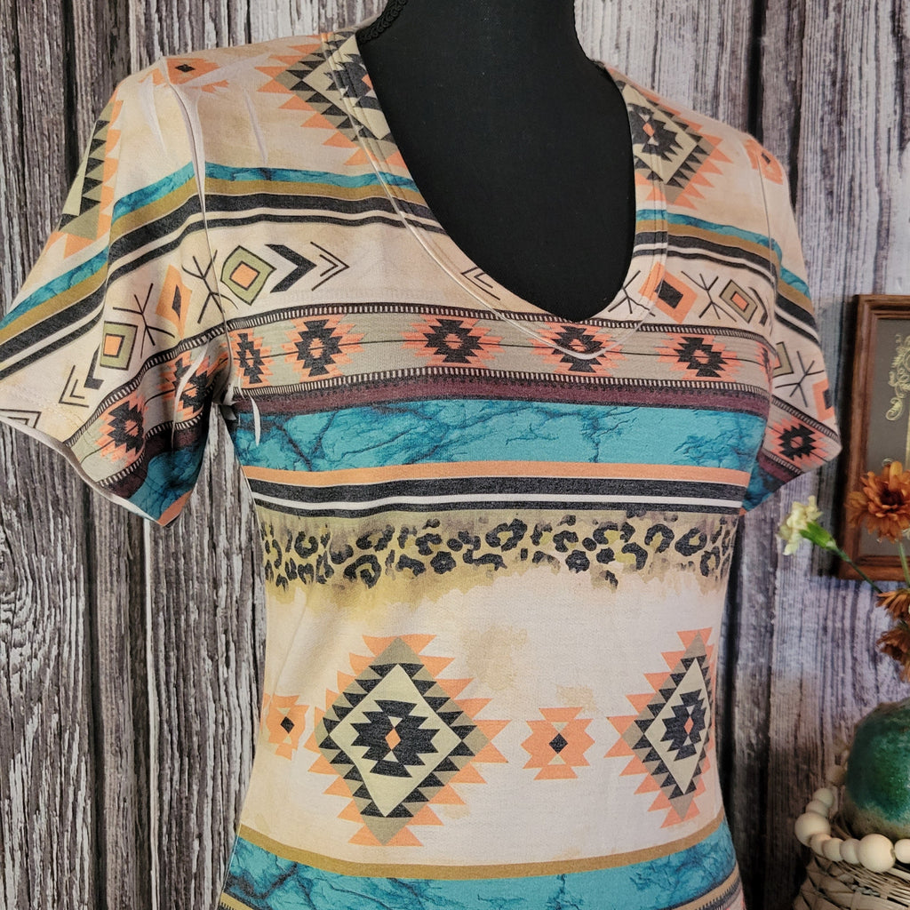 A close-up of the V-neck on the tee.
