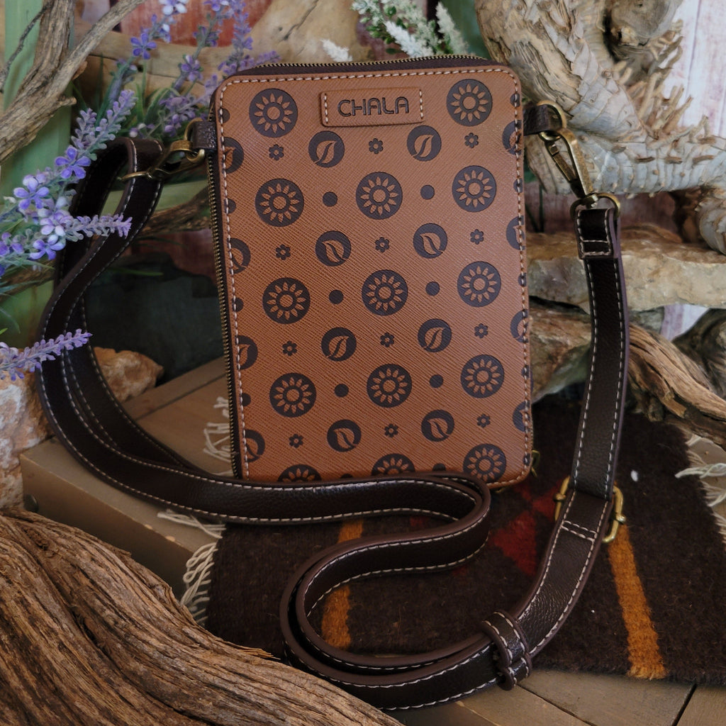 The bag’s solid brown faux leather back features a subtle stitched border.