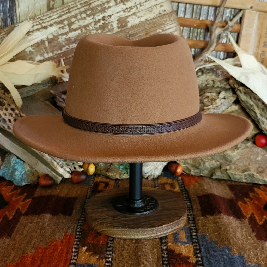 Brown wool hat with decorative leather hat band featuring braided details.