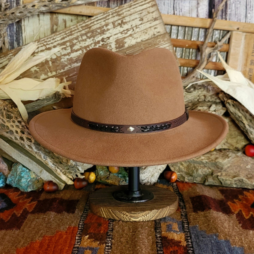 Brown wool hat with decorative leather hat band featuring braided details.