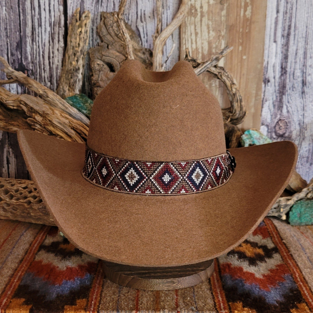 Brown wool hat with beaded decorative band.