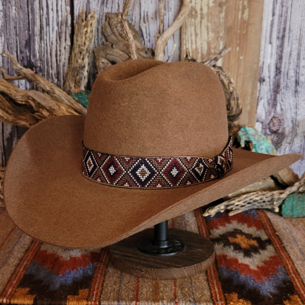 Brown wool hat with beaded decorative band.
