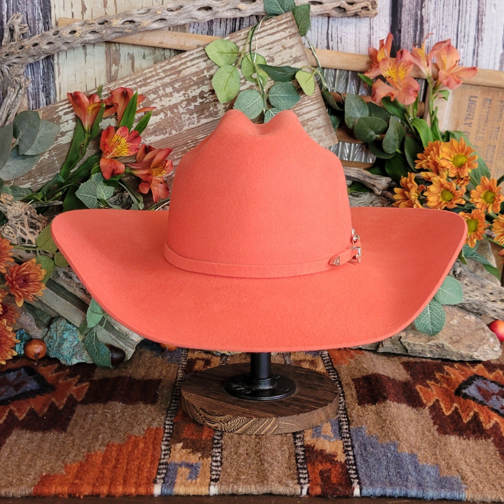 Wool hat in the color tigerlily with matching felt hat band.