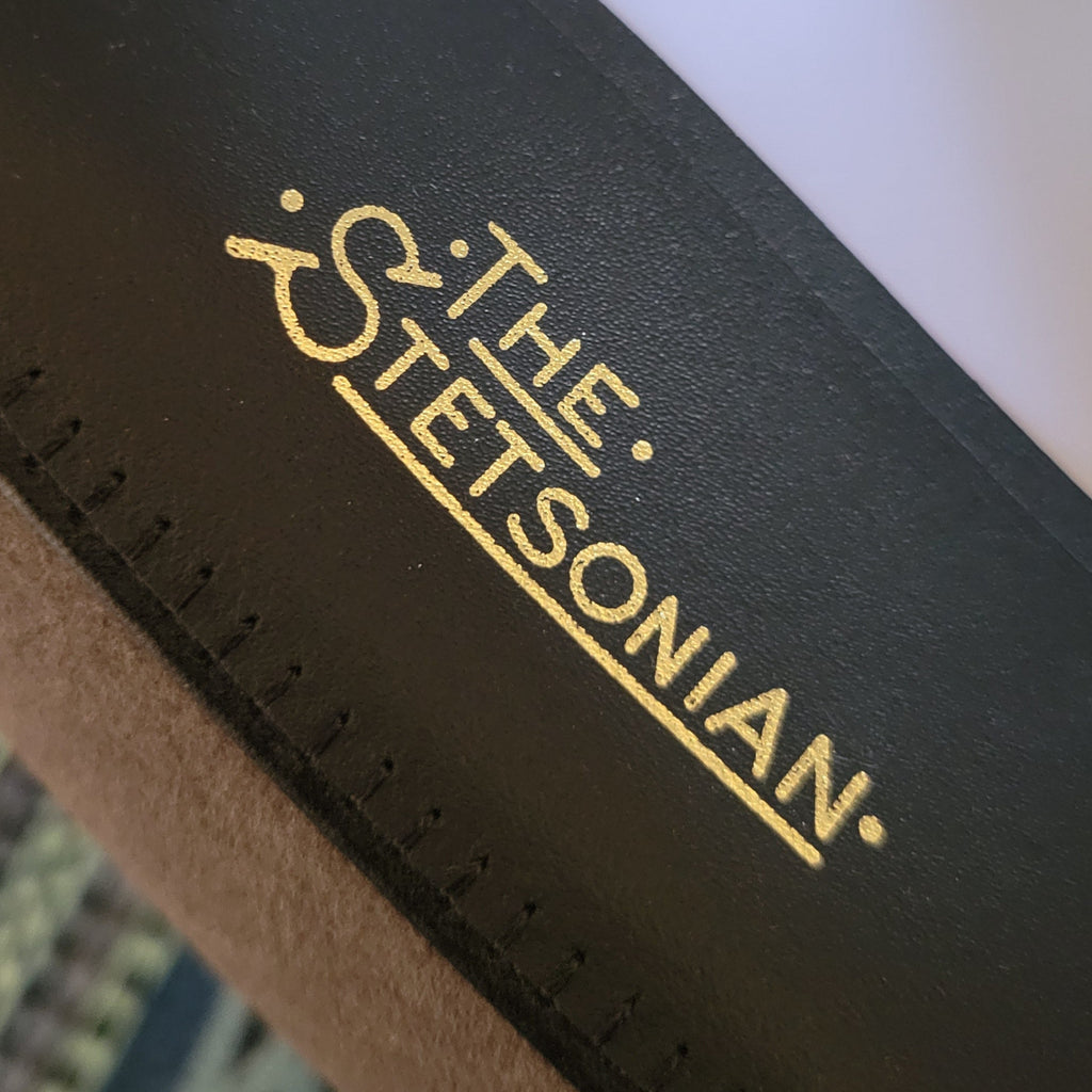 Close-up of "The Stetsonian" lettering found on the hat's sweatband.