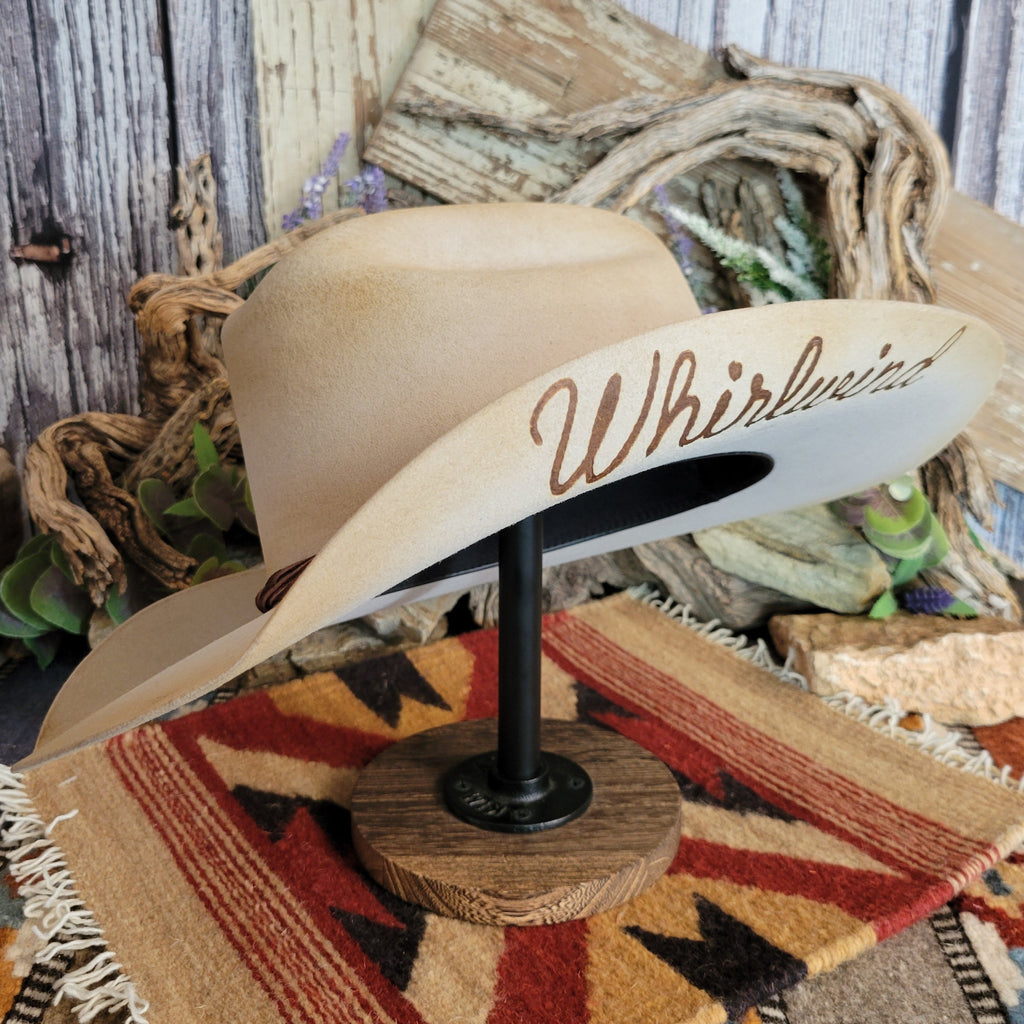The underside of the brim features the "Whirlwind" lettering branded onto the hat.