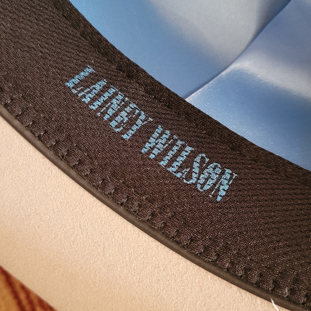 A close-up of the blue "Laney Wilson" lettering on the sweatband.