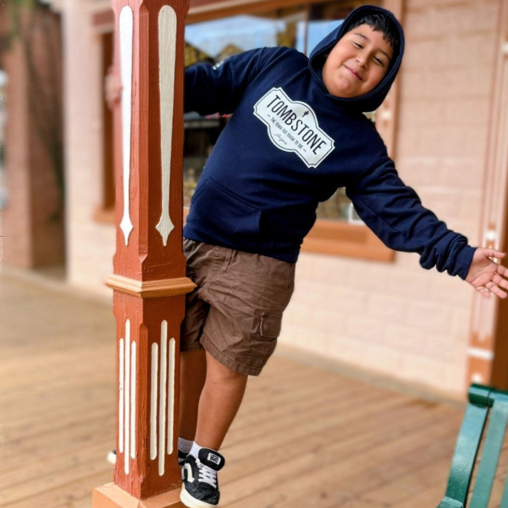 Young boys wearing a dark blue Tombstone hoody.