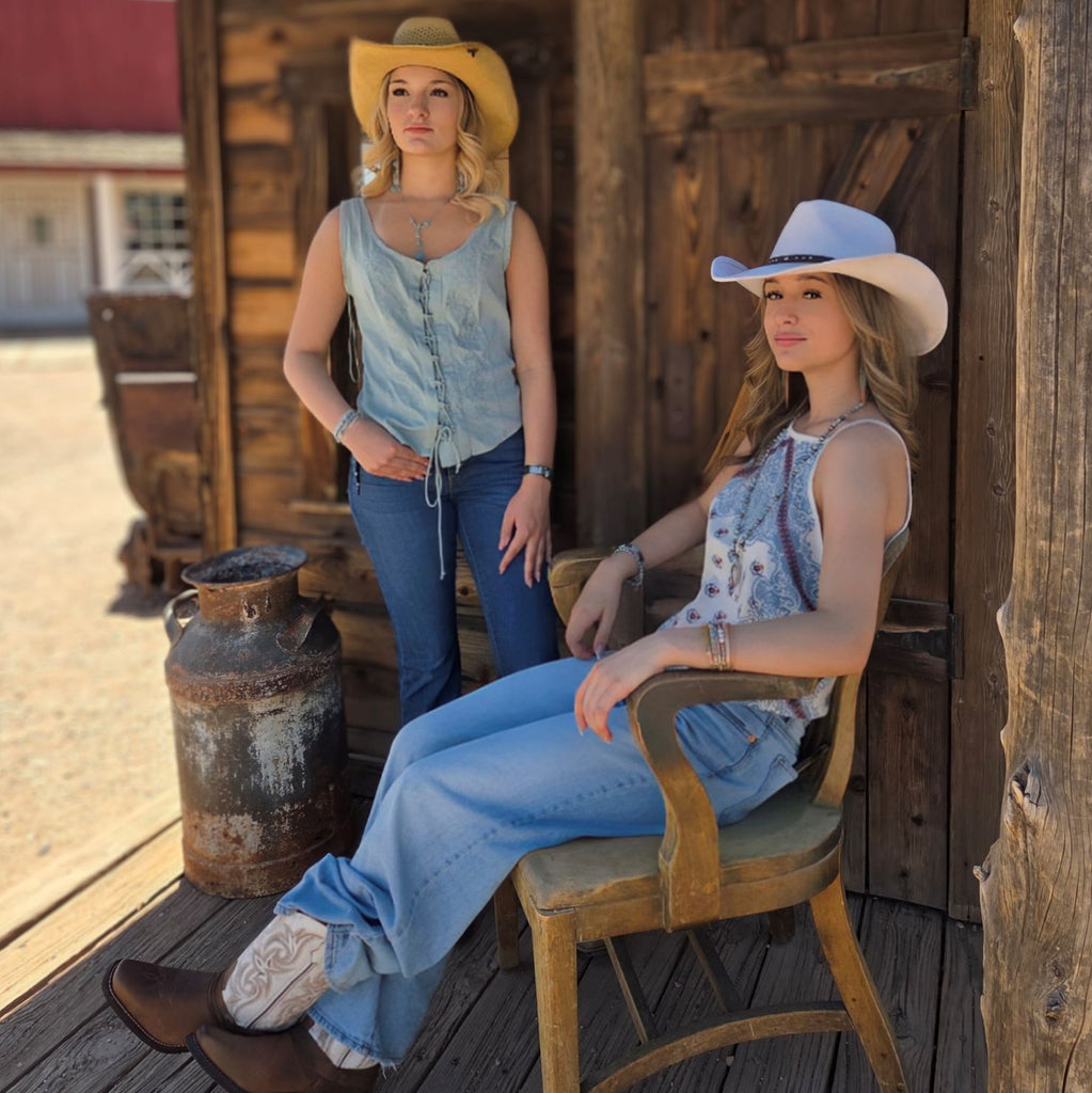 
Two cowgirls rockin’ authentic Western apparel from trusted brands at The Branding Iron in Tombstone, AZ.